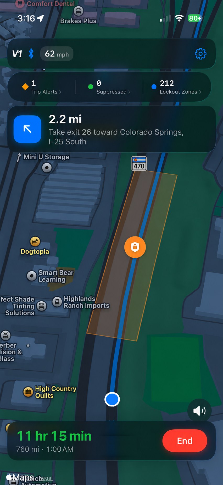 iPhone navigating: V1 status card with speed, trip counters, and the next maneuver over a full-screen map